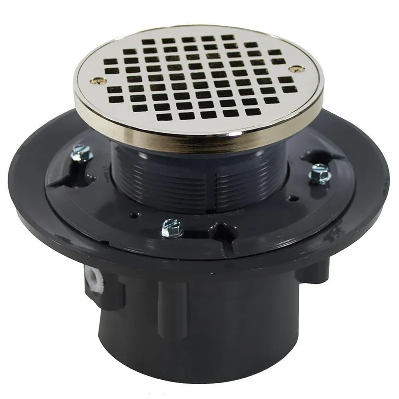 Jones Stephens D49131 3 x 4 in. Heavy Duty PVC Drain Base with 3-1/2 in. Plastic Spud and 5 in. Nickel Bronze Strainer with Ring
