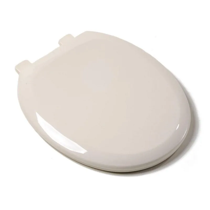 Jones Stephens C1606S02 Comfort Round Plastic Toilet Seat in Biscuit