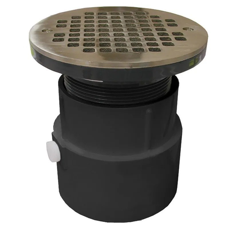 Jones Stephens D53086 4 in. PVC Over Pipe Fit Drain Base with 3-1/2 in. Plastic Spud and 6 in. Nickel Bronze Strainer